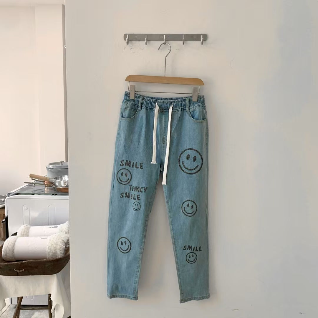 放鬆的微笑|笑臉圖案全橡筋牛仔褲