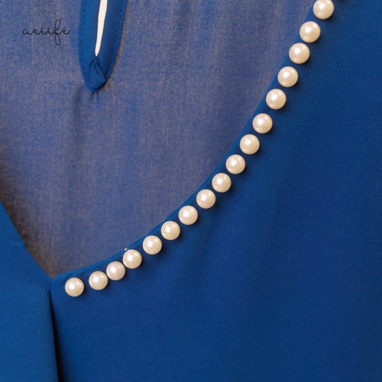 釘珠荷葉邊V領雪紡上衣