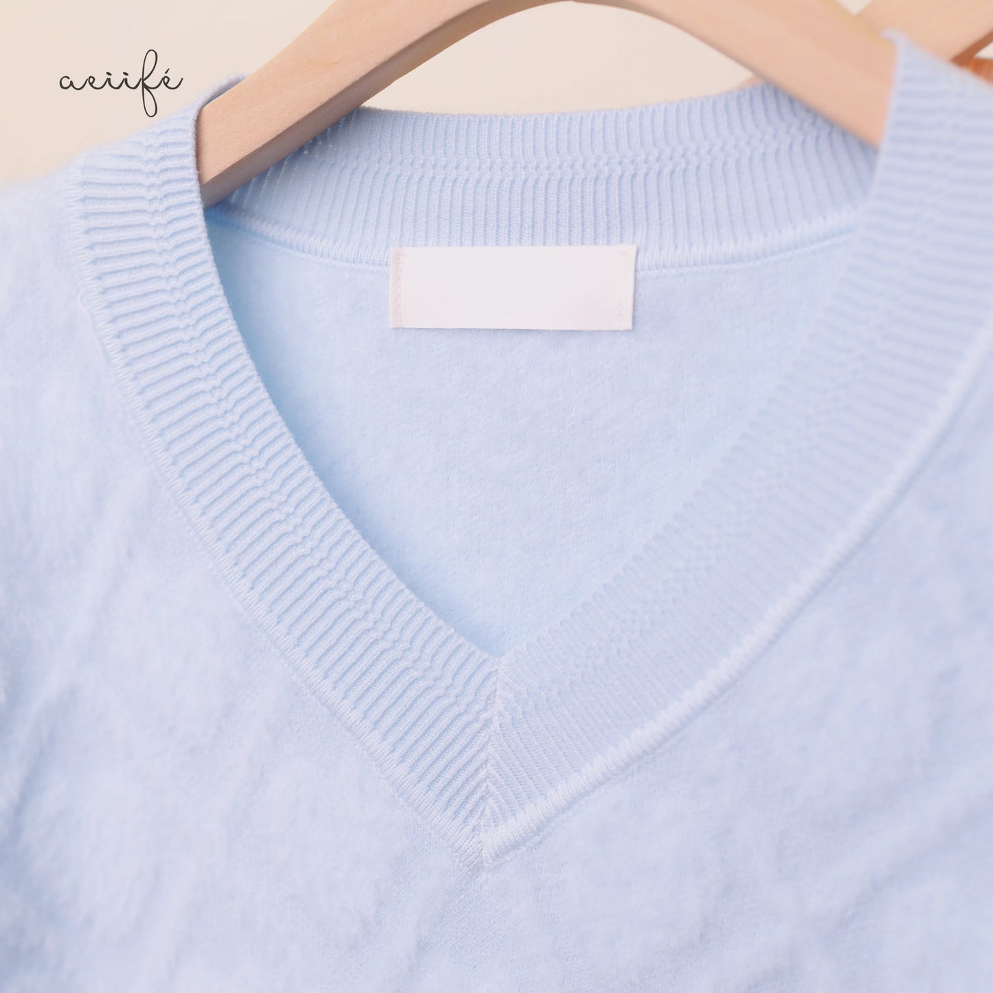 線條菱格絨感針織上衣