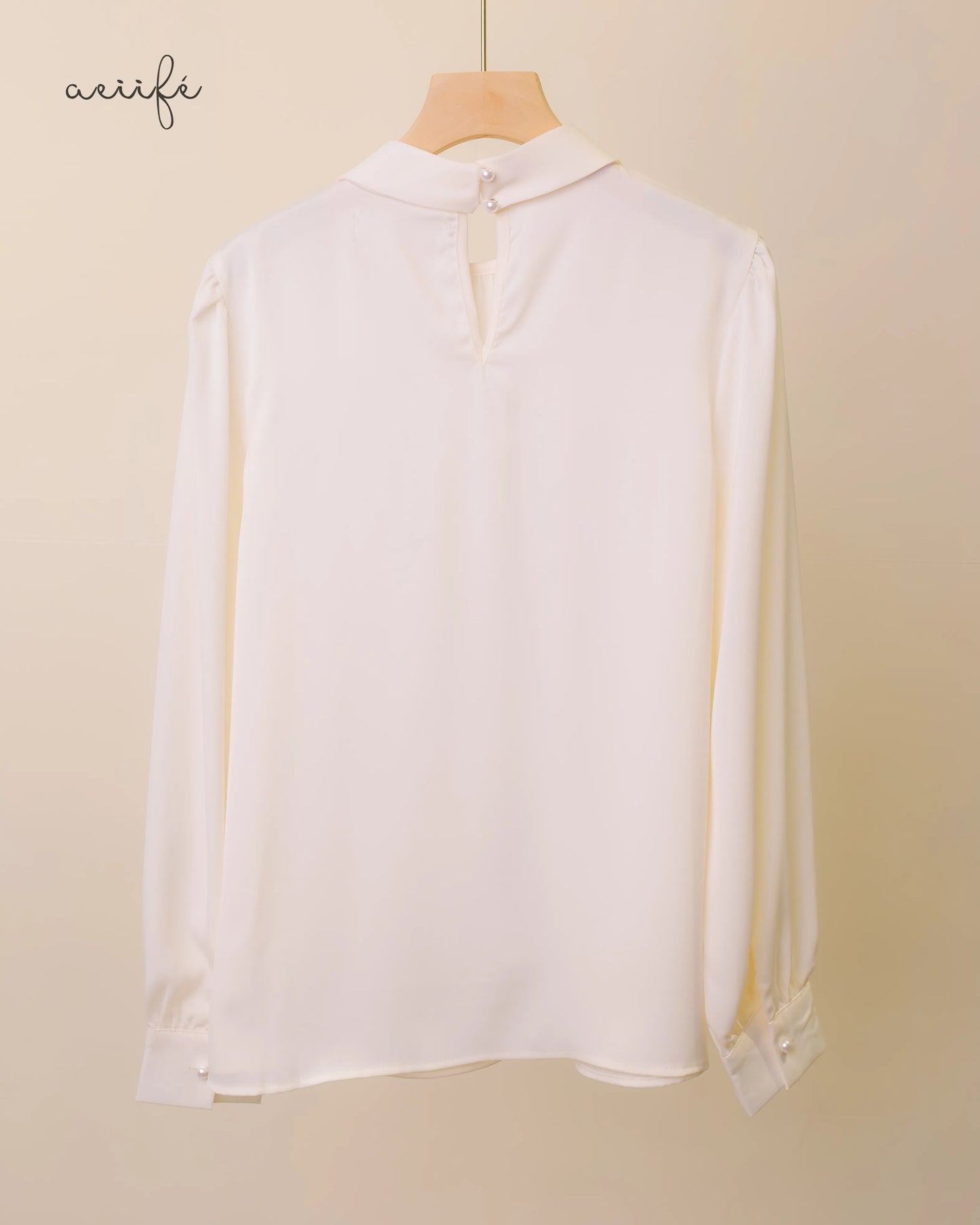 蝴蝶結絲滑綢緞上衣